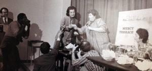 Then mayor of San Francisco, Dianne Feinstein, participates in the lottery for the residents of the first Mercy Housing community