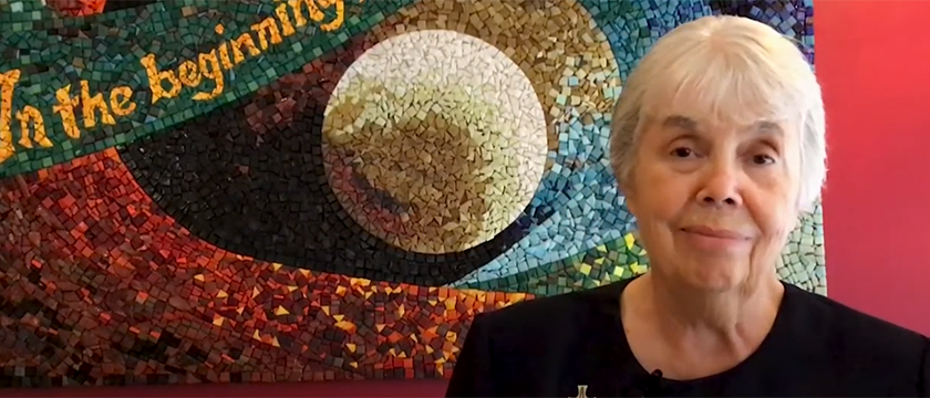 Sister Linda Werthman in front of mosaic