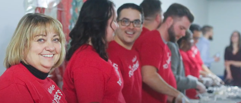 Wells fargo volunteers wearing red shirts