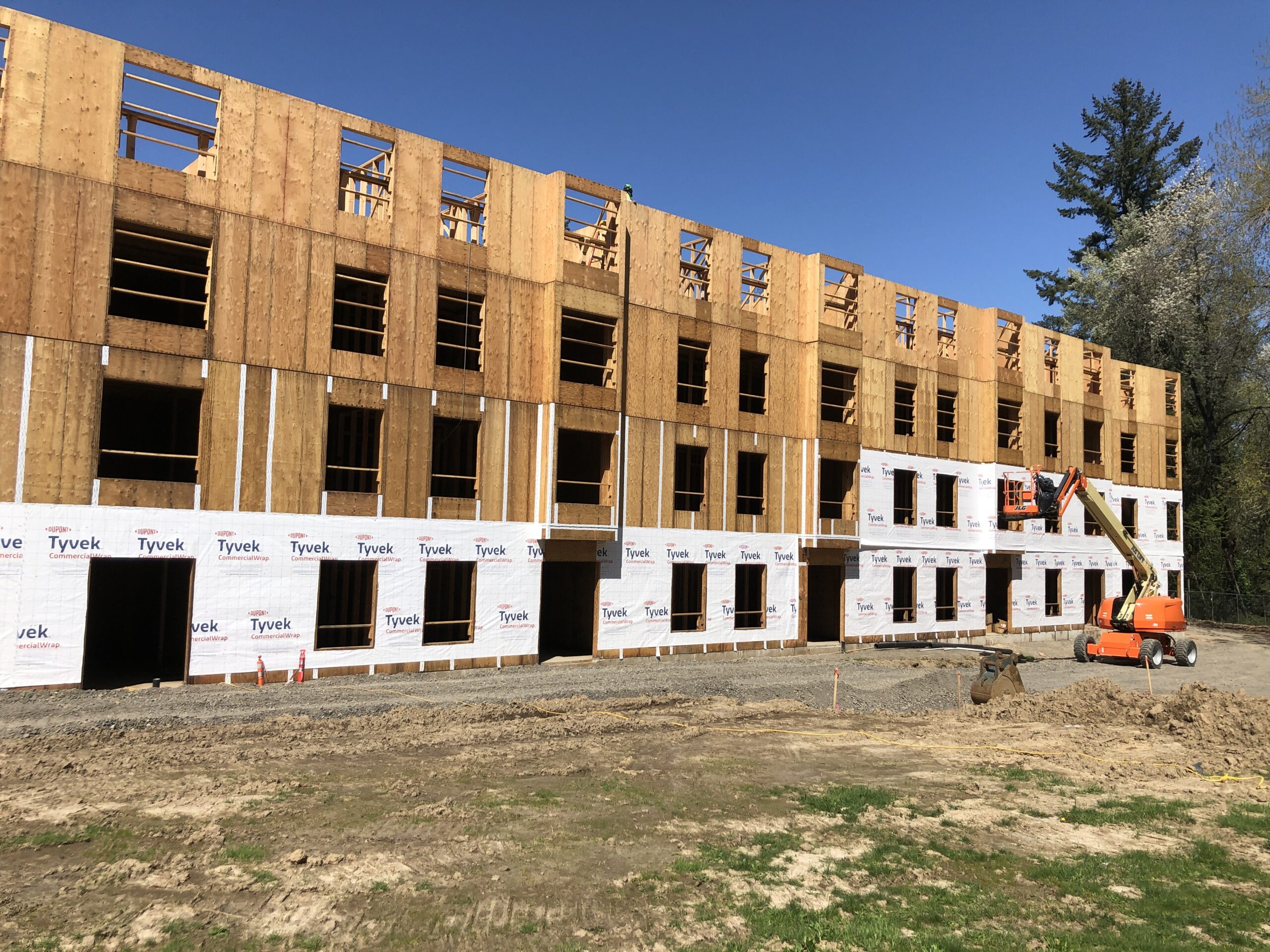 Exterior building wrap progress, April 2023