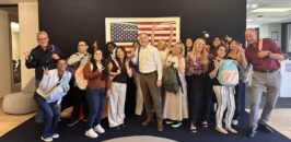 A group of people at the 600 Seventh Street Backpack Drive