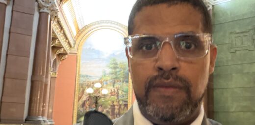 Mercy Housing Lakefront’s Edgar Flagg III, Vice President of Real Estate Development stands in Capitol rotunda