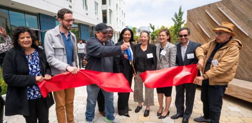 Cutting the big red ribbon at 1633 Valencia