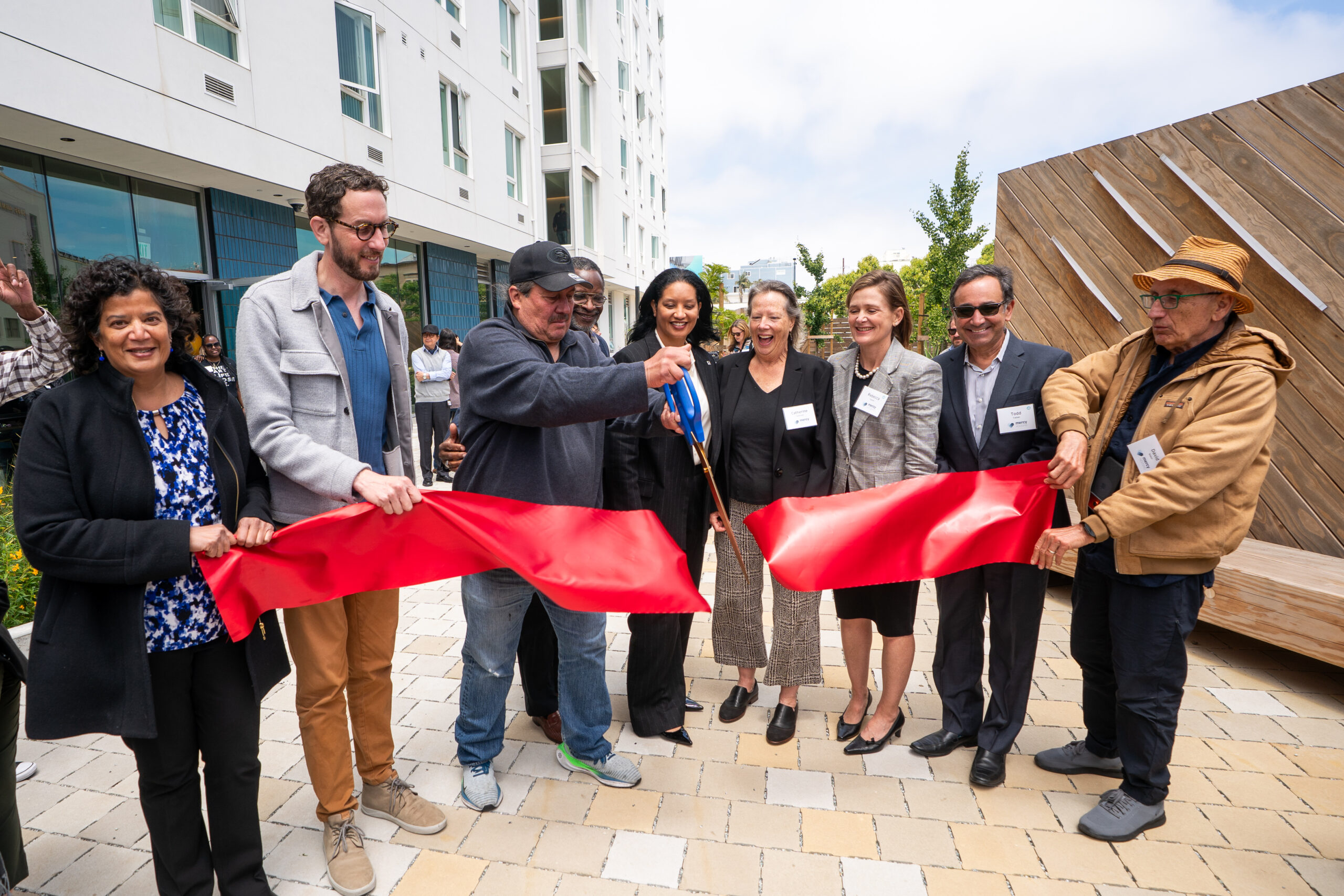 Cutting the big red ribbon at 1633 Valencia